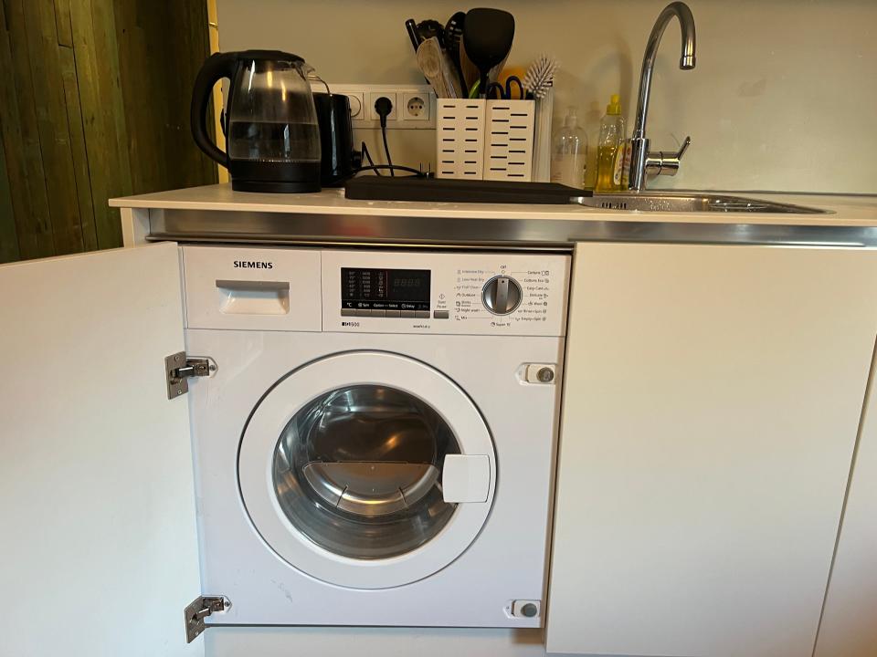 combined washer/dryer in the houseboat kitchen