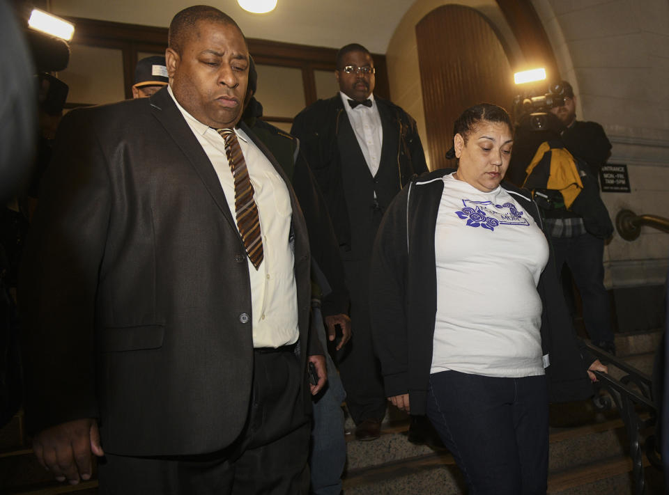 Michelle Kenney, mother of Antwon Rose II, leaves the Allegheny County Courthouse after a not guilty verdict in the homicide trial of former East Pittsburgh police Officer Michael Rosfeld, Friday, March 22, 2019, in downtown Pittsburgh, Pa. A jury acquitted Rosfeld, a former police officer Friday in the fatal shooting of Antwon Rose II, an unarmed teenager as he was fleeing a high-stakes traffic stop outside Pittsburgh, a confrontation that was captured on video and led to weeks of unrest. (Steve Mellon/Pittsburgh Post-Gazette via AP)
