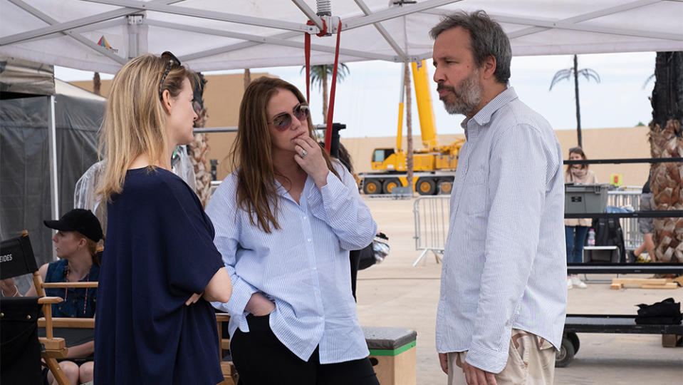 Executive producer Tanya Lapointe, producer Parent and director Villeneuve gather together on the set of “Dune.” - Credit: Chia Bella James