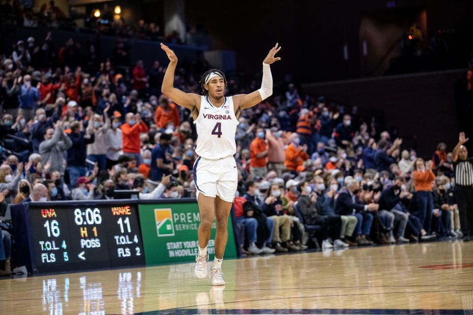 Virginia guard Armaan Franklin (4) celebrates a score during the first half of an NCAA college basketball game against Wake Forest in Charlottesville, Va., Saturday, Jan. 15, 2022. (AP Photo/Erin Edgerton)