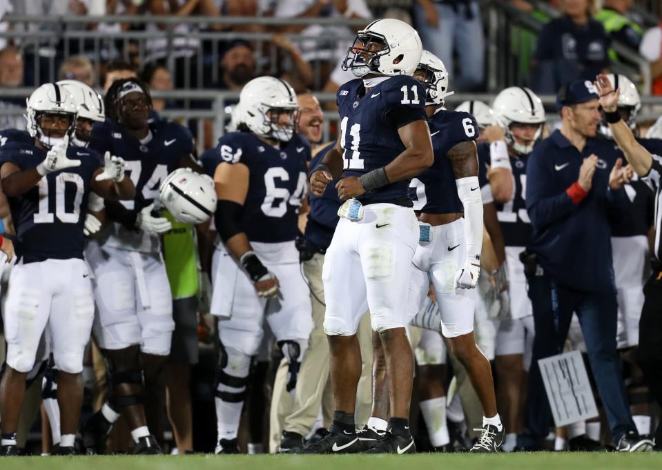 Penn State linebacker Abdul Carter (11) reacts after breaking up a pass against West Virginia on fourth down during the fourth quarter at Beaver Stadium.