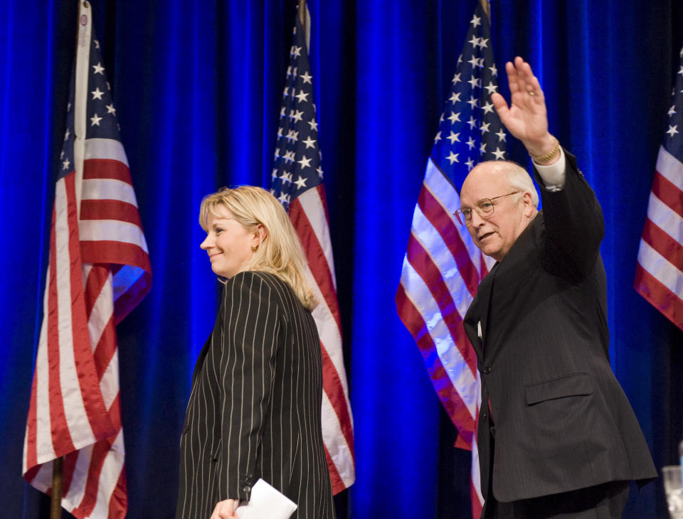 Liz Cheney, board member, Keep America Safe, walks off the stage with her father, former Vice President Dick Cheney, after they addressed the Conservative Political Action Conference (CPAC), in Washington, Thursday, Feb. 18, 2010. (AP Photo/Cliff Owen)