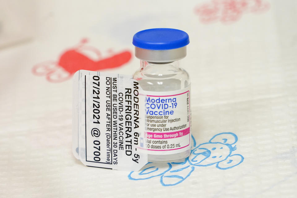 FILE - A vial of the Moderna COVID-19 vaccine for children 6 months through 5 years old is seen, June 21, 2022, at Montefiore Medical Group in the Bronx borough of New York. Nearly 300,000 children under 5 have received a COVID-19 shot in the two weeks since they've been available, with the White House saying the slow pace of vaccinating the eligible population of about 18 million kids was expected. (AP Photo/Mary Altaffer, File)