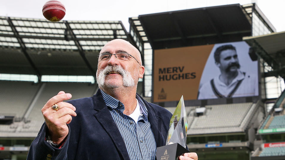 Merv Hughes is seen here accepting his Hall of Fame honour at the MCG.