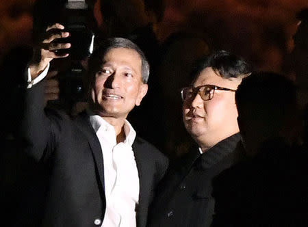 Singapore’s Foreign Minister Vivian Balakrishnan takes a selfie with North Korea’s leader Kim Jong Un during a visit in Merlion Park in Singapore. Source: Reuters