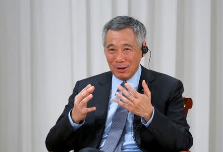 Singapore Prime Minister Lee Hsien Loong speaks at the International Conference on The Future of Asia in Tokyo, Japan, September 29, 2016. REUTERS/Kim Kyung-Hoon/Files