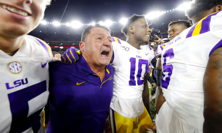 Coach O celebrates following LSU's win over Alabama.