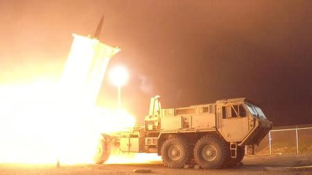 FILE PHOTO - A Terminal High Altitude Area Defense (THAAD) interceptor is launched from the Pacific Spaceport Complex Alaska during Flight Experiment THAAD (FET)-01 in Kodiak, Alaska, U.S. on July 30, 2017. Picture taken on July 30, 2017. Courtesy Leah Garton/Missile Defense Agency/Handout via REUTERS