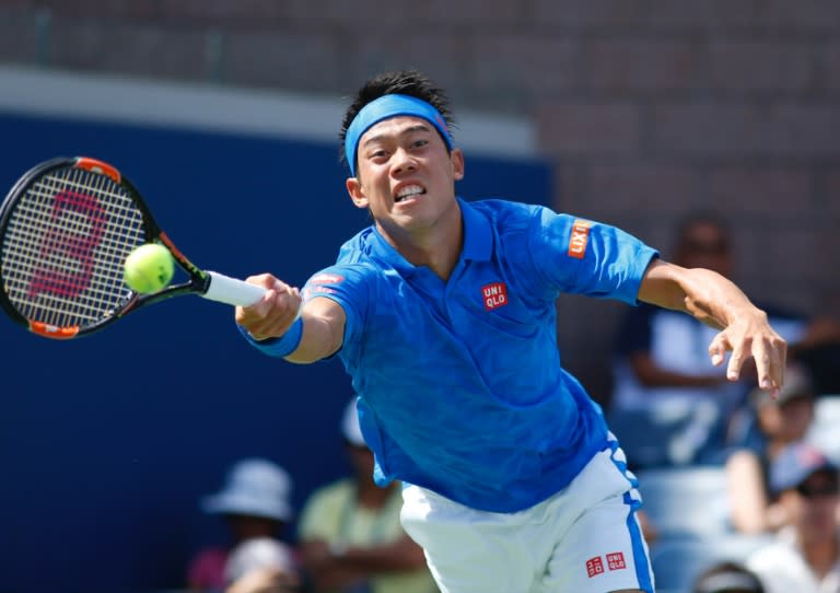 Kei Nishikori of Japan hits a return to Benjamin Becker of Germany during their 2016 US Open Men's Singles match at the USTA Billie Jean King National Tennis Center in New York on August 30, 2016