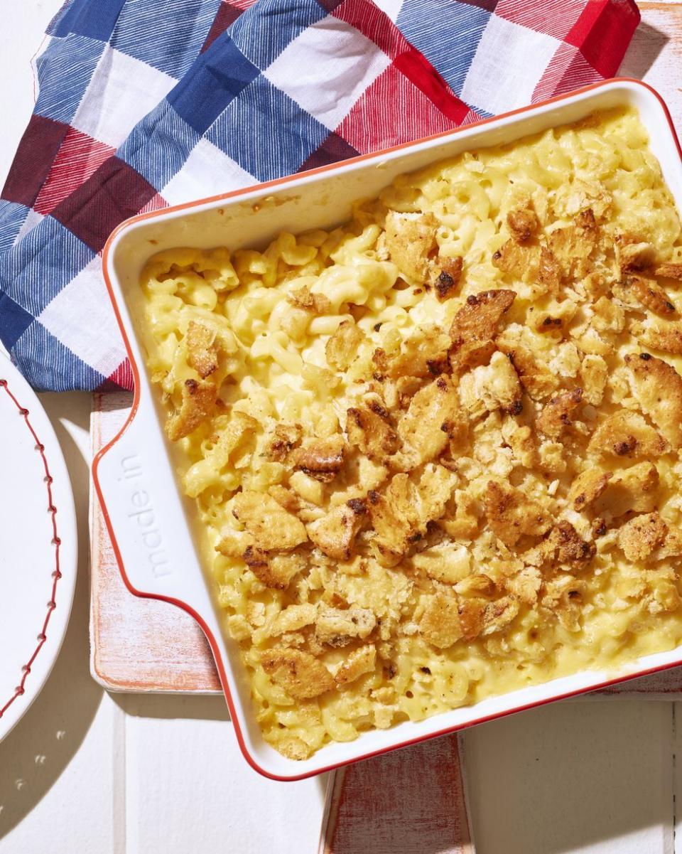 ritzy ranch mac and cheese in a white square baking dish with red trim