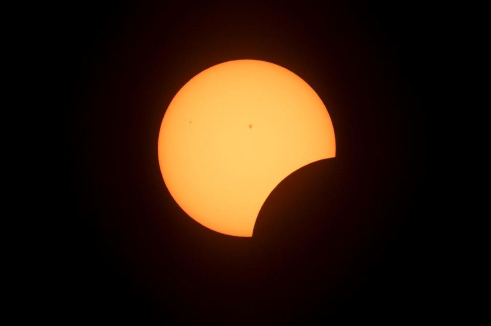 The solar eclipse begins at the Cranbrook Institute of Science in Bloomfield Hills on Monday, April 8, 2024.