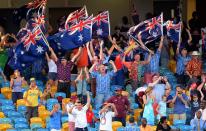 Australian cricket fans cheer their team's victory during the final day of the first-of-three Test matches between Australia and West Indies at the Kensington Oval stadium in Bridgetown on April 11, 2012. Australia defeated West Indies by 3 wickets. AFP PHOTO/Jewel Samad (Photo credit should read JEWEL SAMAD/AFP/Getty Images)