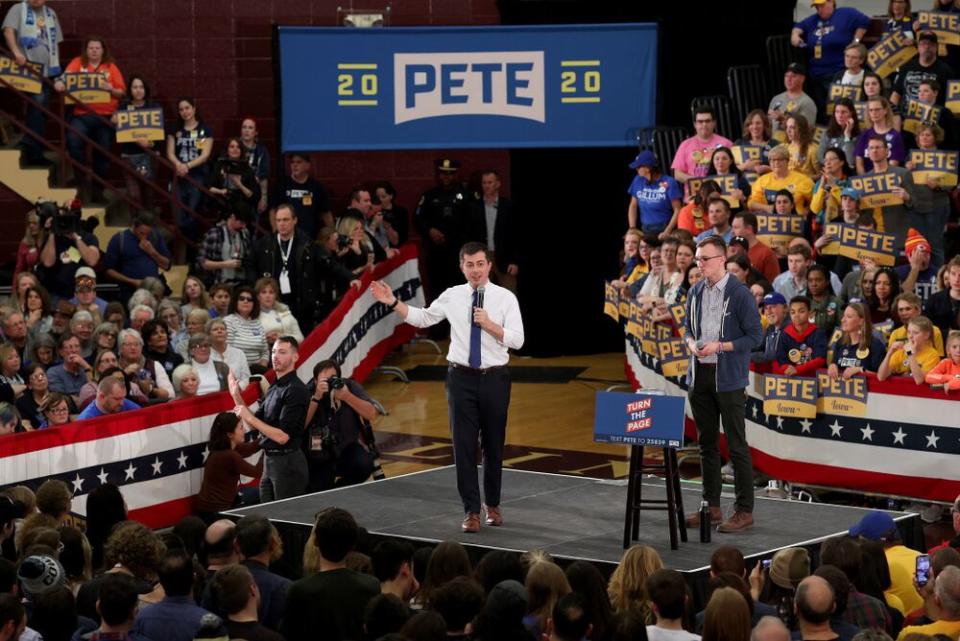 Pete Buttigieg (center) in Iowa | Win McNamee/Getty Images