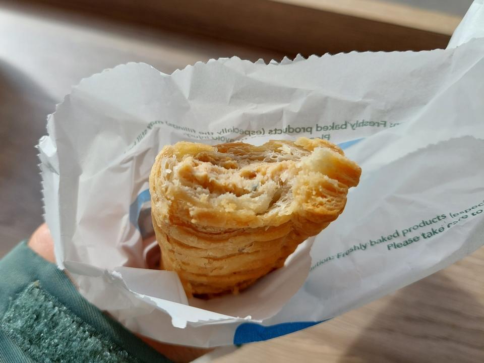 A Greggs sausage roll in a wrapper