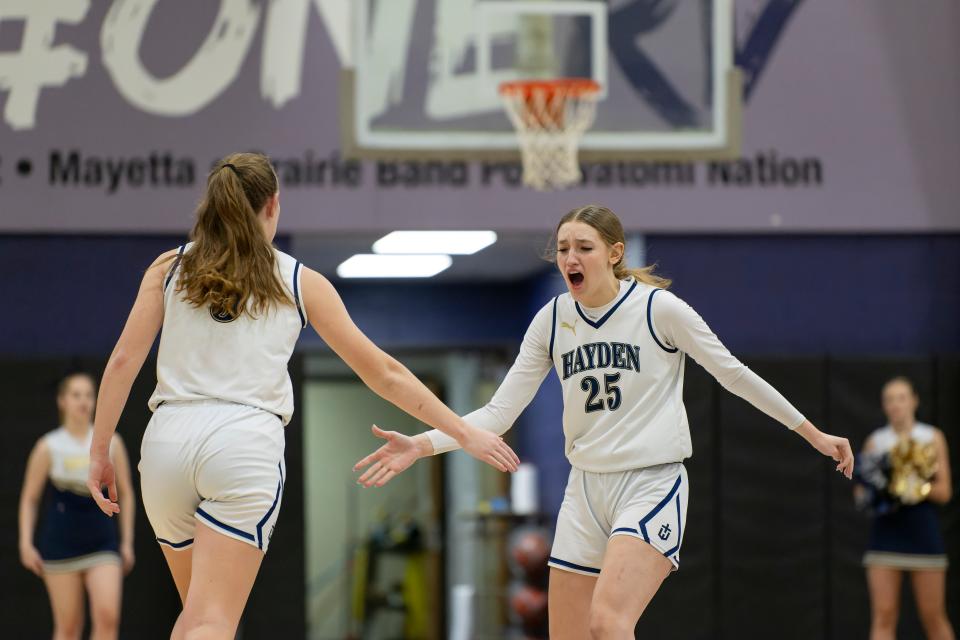 Hayden's Brylee Meier (25) celebrates with Lauren Sandstrom (5) after scoring during Sub-State March. 2, 2024 at Jefferson West High School.