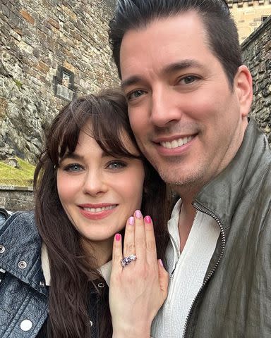 <p>Zooey Deschanel/Instagram</p> Zooey Deschanel showing off her engagement ring in August 2023 after Jonathan Scott proposed in Scotland.