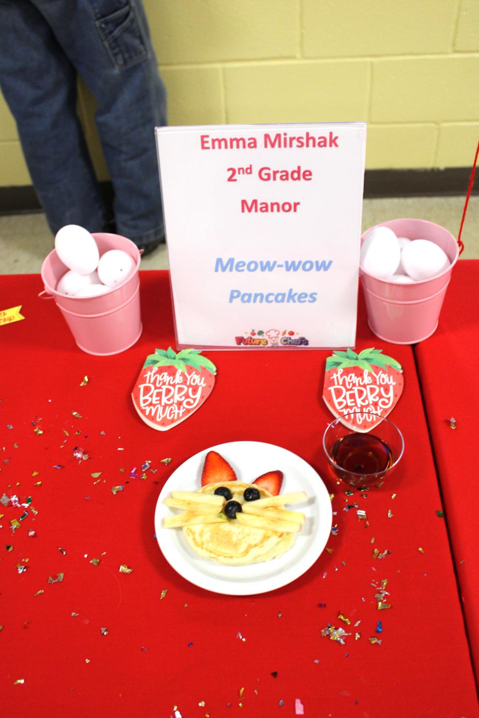 Emma's award-winning Meow-wow Pancakes are shown.