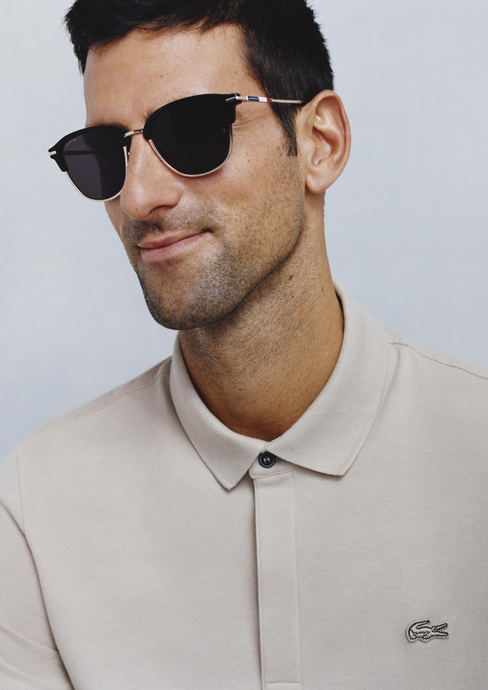 Novak Djokovic in Lacoste sunglasses.