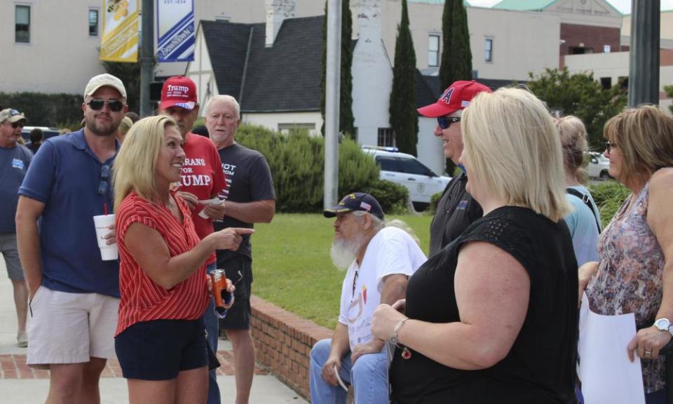 US House district 14 candidate Marjorie Taylor Greene talks with people at a Back the Blue Rally in front of Rome city hall on 15 June 2020 in Rome, Georgia.