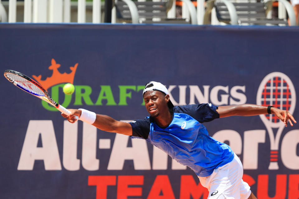 ATLANTA, GA - JULY 5: Christopher Eubanks of the United States returns the ball against John Isner of the United States during the final day of the DraftKings All-American Team Cup on July 5, 2020 in Atlanta, Georgia. (Photo by Carmen Mandato/Getty Images)