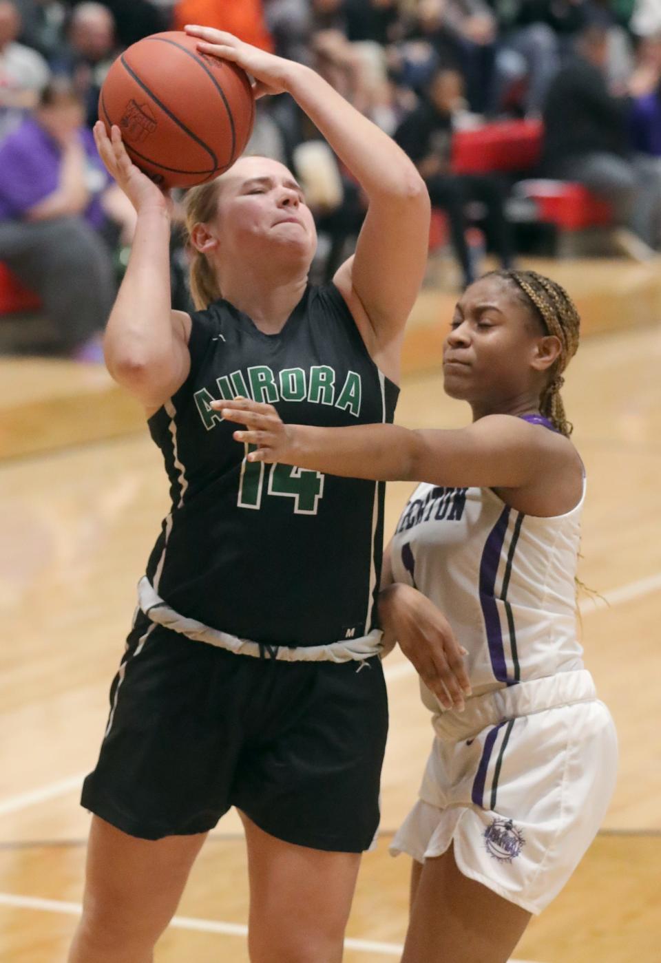 Aurora's Ava Ryncarz puts up a shot in the paint as Barberton's Antaniyah defends on Monday March 14, 2022 in Norton, Ohio, in the Women's Tri-County Basketball Coaches Association All-Star game.