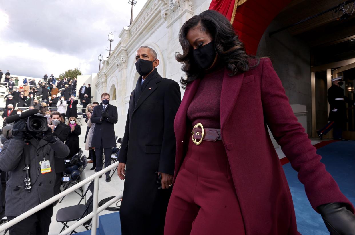 <p>Former U.S. President Barack Obama and wife Michelle Obama arrive for the inauguration of U.S. President-elect Joe Biden</p> (Getty)