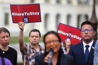 Immigrant rights organizations rally to to call on Congress to create a path to permanent status for TPS holders and DACA recipients at the U.S. Capitol in Washington