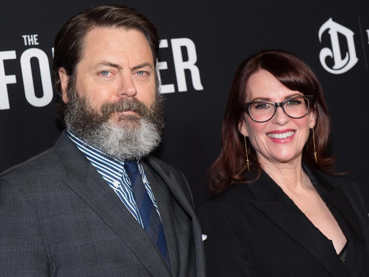 Nick Offerman (L) and Megan Mullally attend the premiere of the Weinstein Company's 'The Founder' at ArcLight Cinemas Cinerama Dome on January 11, 2017 in Hollywood, California