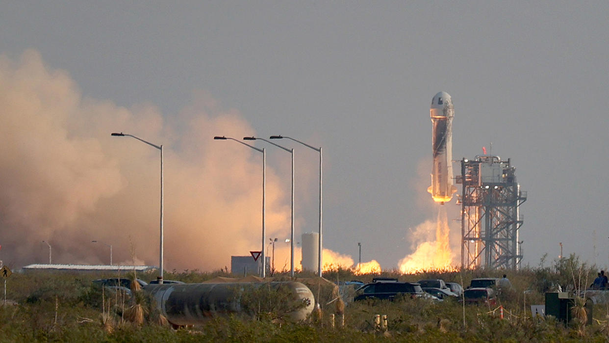 The New Shepard Blue Origin rocket lifts off from the launch pad carrying Jeff Bezos in Van Horn, Texas, Tuesday. (Photo by Joe Raedle/Getty Images)