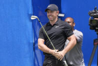 Rory McIlroy, of Northern Ireland, reacts to his chip onto the ninth green during the second round of the PGA Zurich Classic golf tournament at TPC Louisiana in Avondale, La., Friday, April 26, 2024. (AP Photo/Gerald Herbert)