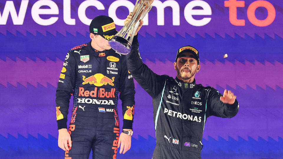 Lewis Hamilton celebrated victory over Max Verstappen in the Saudi Arabian GP, setting up a thrilling championship decider at the final race of the F1 season. (Photo by GIUSEPPE CACACE/AFP via Getty Images)