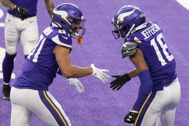 Justin Jefferson celebrates with Bisi Johnson of the Minnesota Vikings after scoring a touchdown. (Photo by Stephen Maturen/Getty Images)