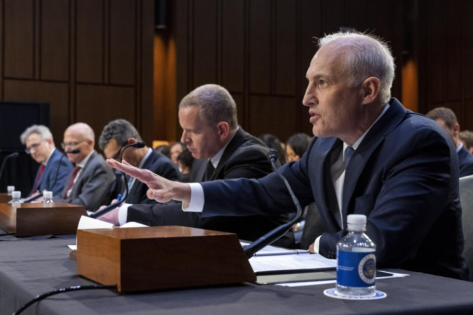 Matt Olsen, Assistant Attorney General of the National Security Division of the Department of Justice, right, testifies with, from far left, Chris Fonzone, General Counsel at the Office of the Director of National Intelligence, George Barnes, Deputy Director of the National Security Agency (NSA), David Cohen, Deputy Director of the Central Intelligence Agency (CIA), and Paul Abbate, Deputy Director of the Federal Bureau of Investigation (FBI), during a Senate Judiciary Oversight Committee hearing to examine Section 702 of the Foreign Intelligence Surveillance Act and related surveillance authorities, Tuesday, June 13, 2023, on Capitol Hill in Washington. (AP Photo/Jacquelyn Martin)