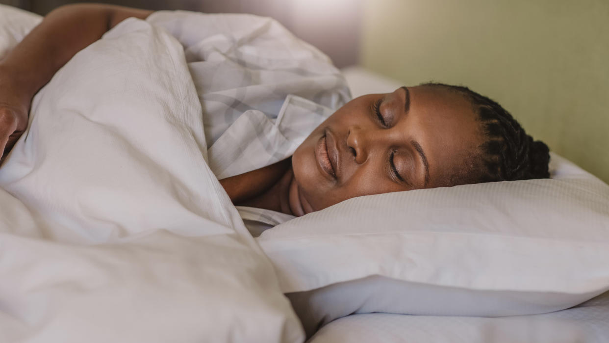  A woman asleep in bed 