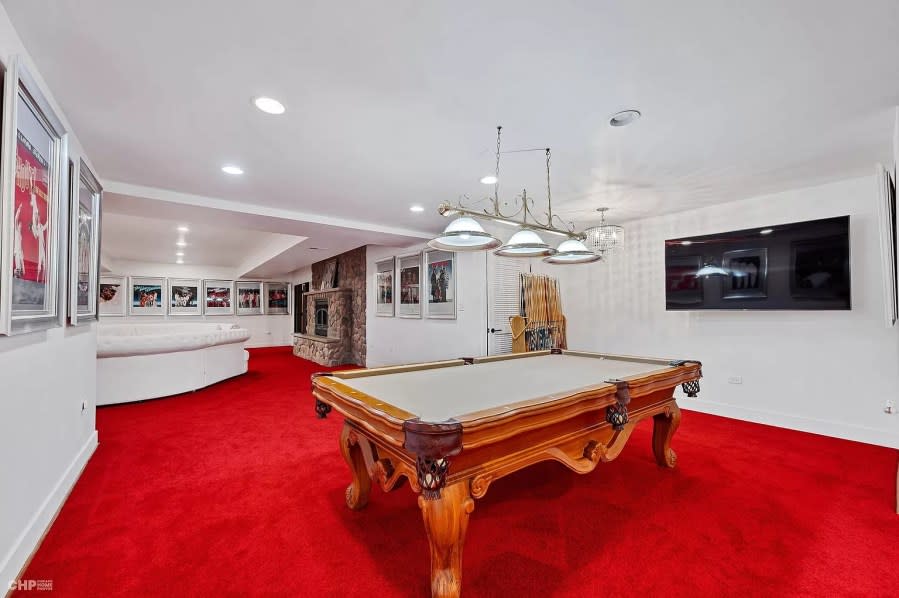 A billiards table in the rec room. (PHOTO: Chicago Home Photos)