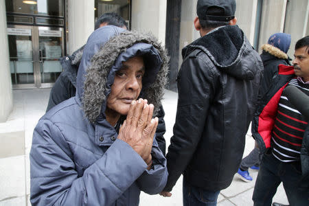 Santhanaladchumy Kanagaratnam, mother of Kirushna Kumar Kanagaratnam who was killed by Canadian serial killer Bruce McArthur, gestures after McArthur was sentenced to life imprisonment following his guilty plea to eight counts of first-degree murder, in Toronto, Ontario, Canada, February 8, 2019. REUTERS/Chris Helgren