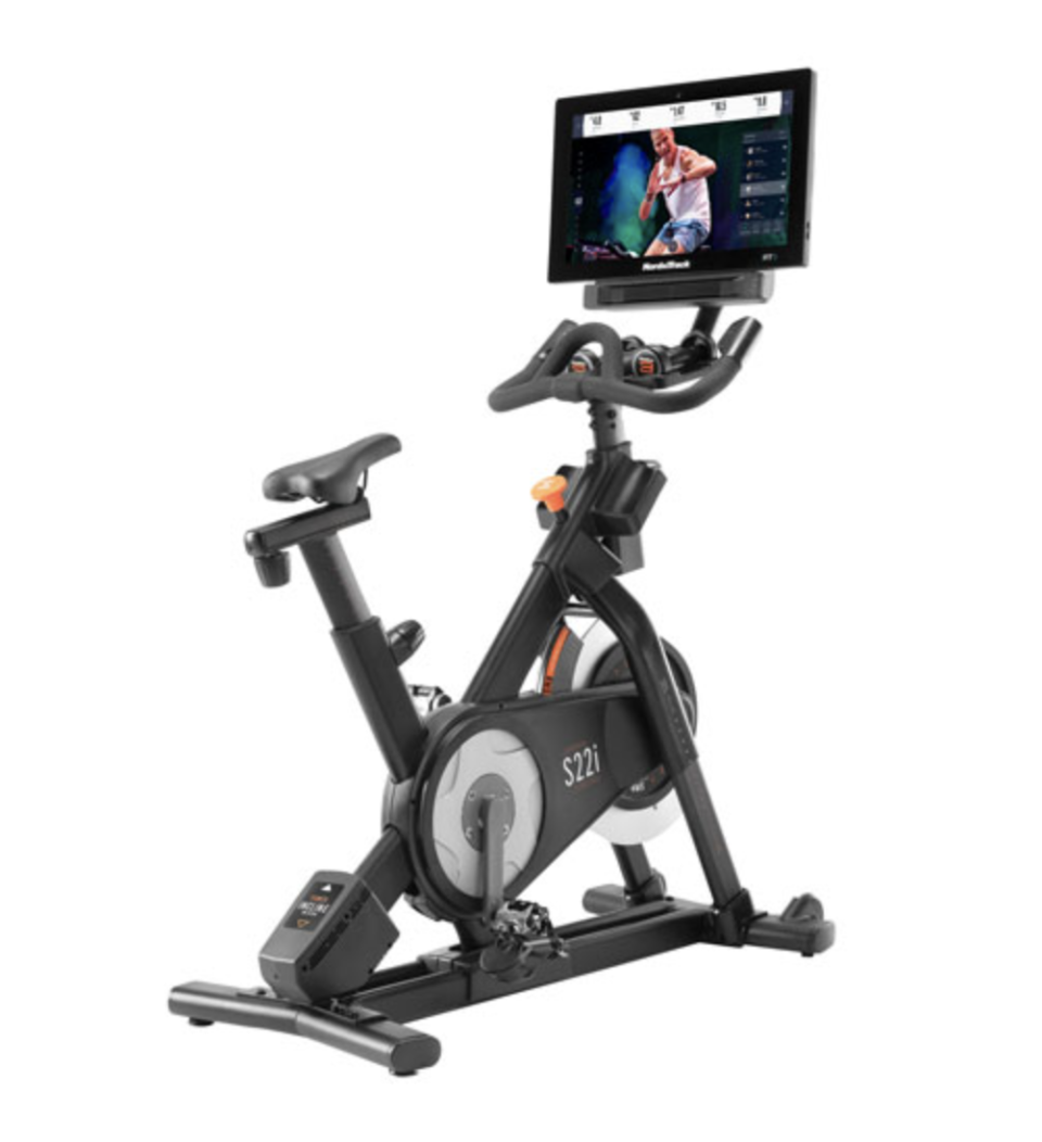 NordicTrack Commercial S22i Studio Cycle Exercise Bike with man on tv screen (Photo via Best Buy Canada)