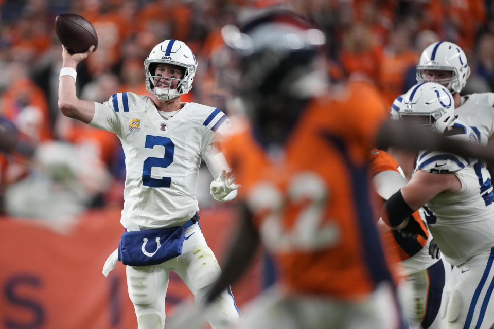 Indianapolis Colts quarterback Matt Ryan (2) throws against the Denver Broncos during the first half of an NFL football game, Thursday, Oct. 6, 2022, in Denver. (AP Photo/David Zalubowski)