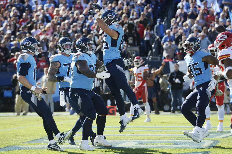 Tennessee Titans tight end Anthony Firkser (86) celebrates with offensive guard Rodger Saffold (76) after Firkser scored a touchdown against the Kansas City Chiefs in the first half of an NFL football game Sunday, Nov. 10, 2019, in Nashville, Tenn. (AP Photo/Mark Zaleski)