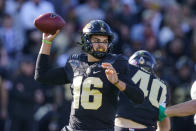 Purdue quarterback Aidan O'Connell (16) throws against Michigan State during the first half of an NCAA college football game in West Lafayette, Ind., Saturday, Nov. 6, 2021. (AP Photo/Michael Conroy)