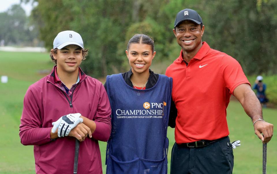 PHOTO: Tiger Woods with his son Charlie Woods and his daughter Sam Woods who was caddying for Tiger during the final round of the PNC Championship at The Ritz-Carlton Golf Club, Dec. 17, 2023 in Orlando, Florida. (David Cannon/Getty Images)