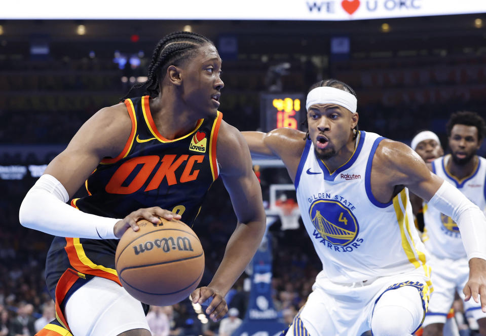 Nov 3, 2023; Oklahoma City, Oklahoma, USA; Oklahoma City Thunder forward Jalen Williams (8) drives to the basket around Golden State Warriors guard <a class="link " href="https://sports.yahoo.com/nba/players/6556" data-i13n="sec:content-canvas;subsec:anchor_text;elm:context_link" data-ylk="slk:Moses Moody;sec:content-canvas;subsec:anchor_text;elm:context_link;itc:0">Moses Moody</a> (4) during the second quarter at Paycom Center. Mandatory Credit: Alonzo Adams-USA TODAY Sports