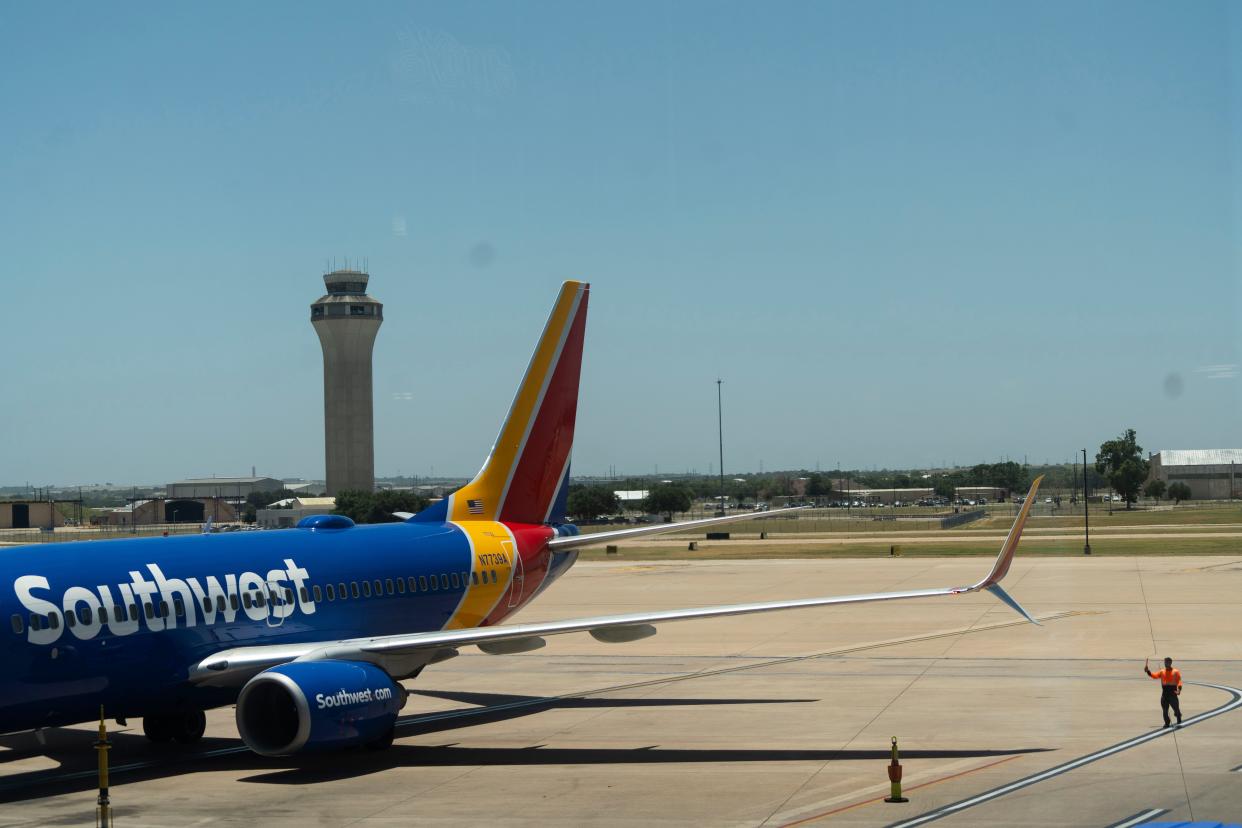 A Southwest Airlines plane arrives in July at Austin-Bergstrom International Airport. Another Southwest plane in February came perilously close to a collision with a FedEx cargo plane.
