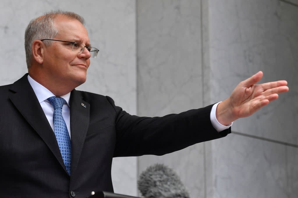 Scott Morrison speaks to the media during a press conference in Canberra, Monday, Feb. 7, 2022 (AP)