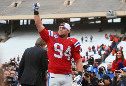 DALLAS, TX - DECEMBER 26: Houston Bates #94 of the Louisiana Tech Bulldogs celebrates a 35-18 win against the Illinois Fighting Illini during the Zaxby&#39;s Heart of Dallas Bowl at Cotton Bowl on December 26, 2014 in Dallas, Texas. (Photo by Ronald Martinez/Getty Images)