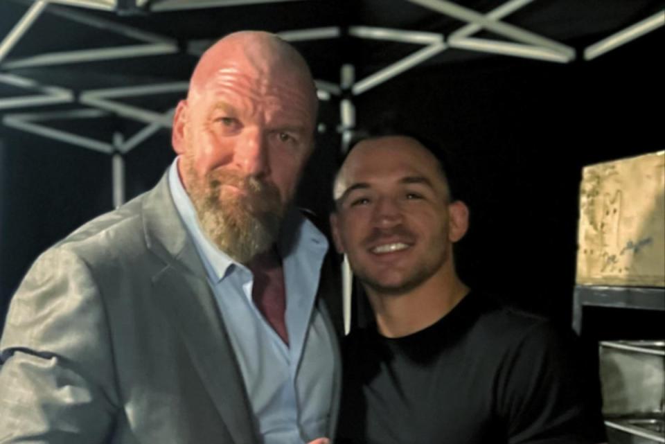 Chandler (right) with WWE executive and former wrestler Triple H (@tripleh and @tkogrp via Instagram)