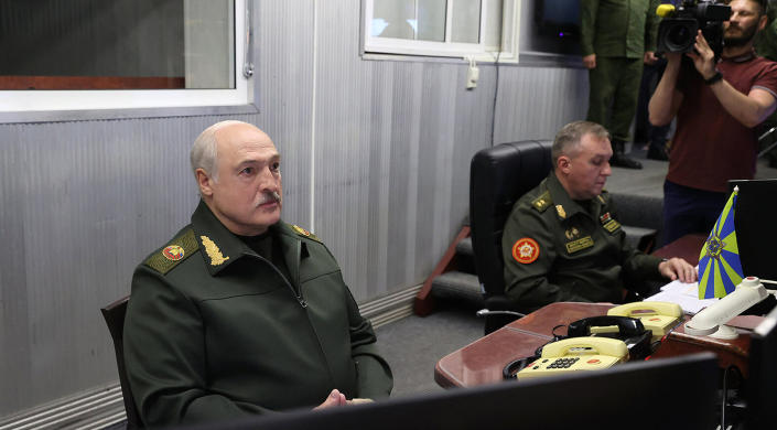 In this handout photo released by Belarus' Presidential Press Office, Belarusian President Alexander Lukashenko visits the Central Command Post of the Air Force and Air Defense Forces in Belarus, Monday, May 15, 2023. (Belarus' Presidential Press Office via AP)