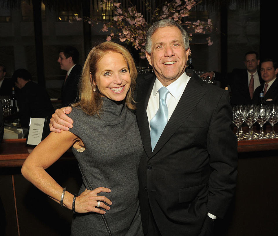 Katie and Les posing for a photo together at an event