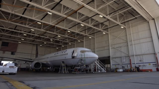 United Airlines airplane sitting in the garage