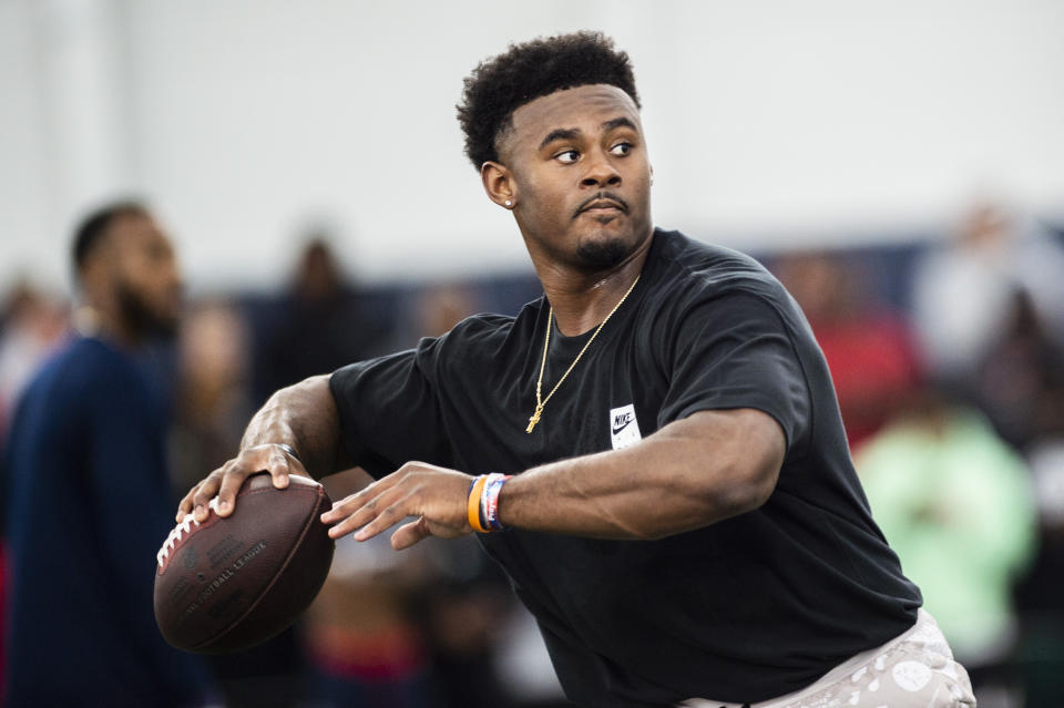 Liberty quarterback Malik Willis runs through passing drills during Liberty Football Pro Day in Lynchburg, Va., on Tuesday, March 22, 2022. (AP Photo/Kendall Warner)